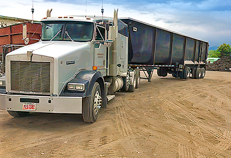 Scrap transport truck recycling yard